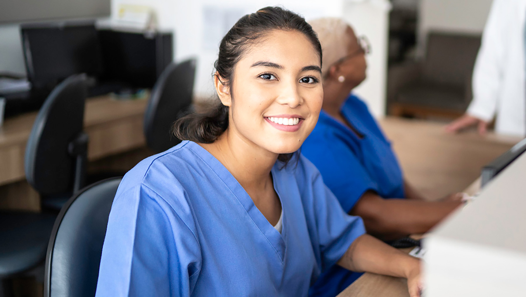 female taking a medical assistant course