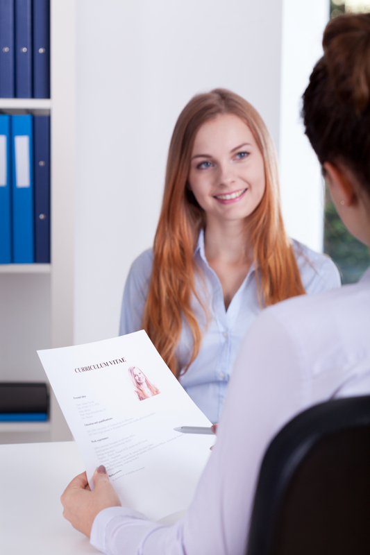 woman with medical assistant certification interviews for a job