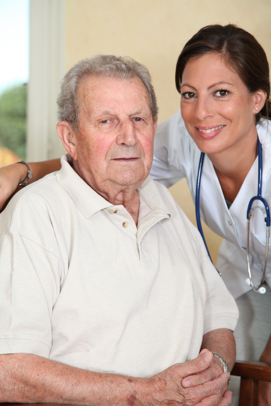 medical assistant with elderly gentleman