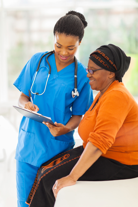 phlebotomist talking with patient